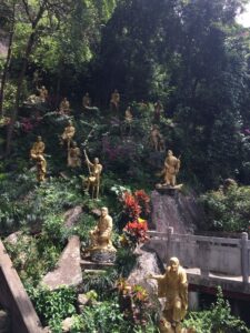Gold Statues on Surrounding Rocks 10000 Buddhas Monastery Hong Kong